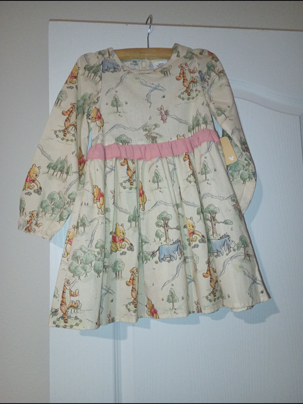 Disney Winnie the Pooh Cream Dress with Pink Waistband